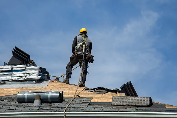 Professional Gutter Installation technician working in Columbia, IA